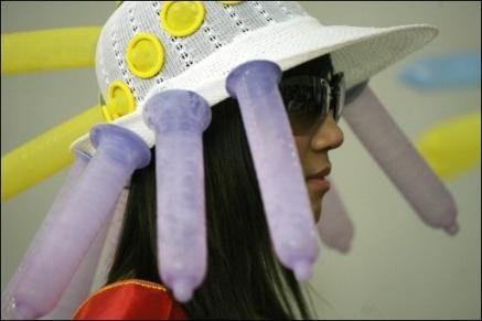 chinese-condom-hat <em>Cheap Chinese condoms... go ahead, try one!</em>