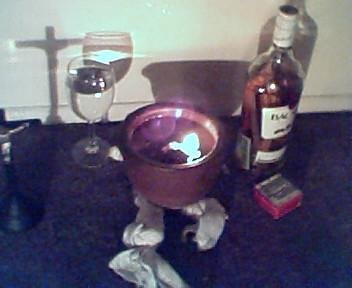lamp_gede_konn_komande <em>The bottle on the right must help with the spiritual mounting</em>